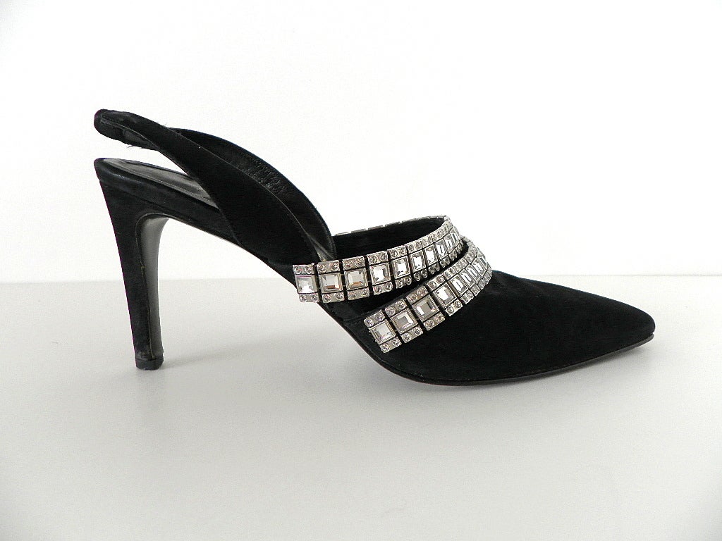 Guaranteed authentic STEPHANE KELIAN Vintage Nubak suede and diamante slingback. 
Black suede with 2 rows of square and round diamantes running around the foot.
The perfect pointy and round toe in one.
Thin straight suede heel.
more pictures