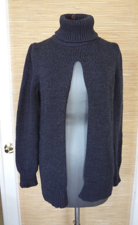 **Buyer MUST contact me prior to purchase for shipping and payment requirement details.
mad4couture@gmail.com**
Guaranteed authentic smashing LOUIS VUITTON sweater.  
Deep gray turtleneck in a rich knit.
The front is open. 
Divine with a white