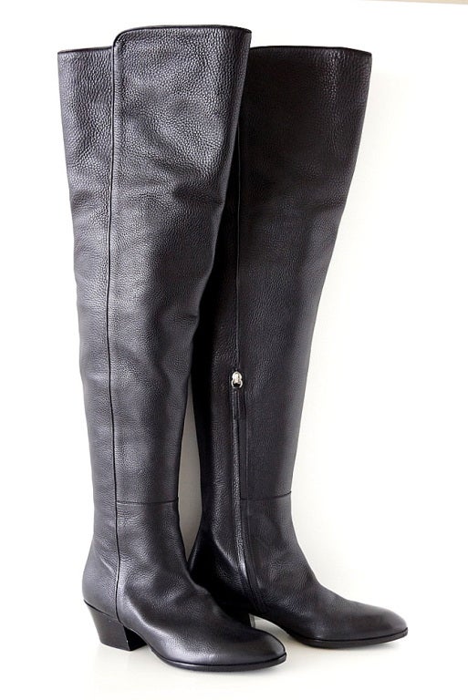 **Buyer MUST contact me prior to purchase for shipping and payment requirement details.
mad4couture@gmail.com**
Fabulous thigh high boot that is wow.
Cut a teeny bit higher in the front at thigh.
Pebbled black leather with a zipper on the inner