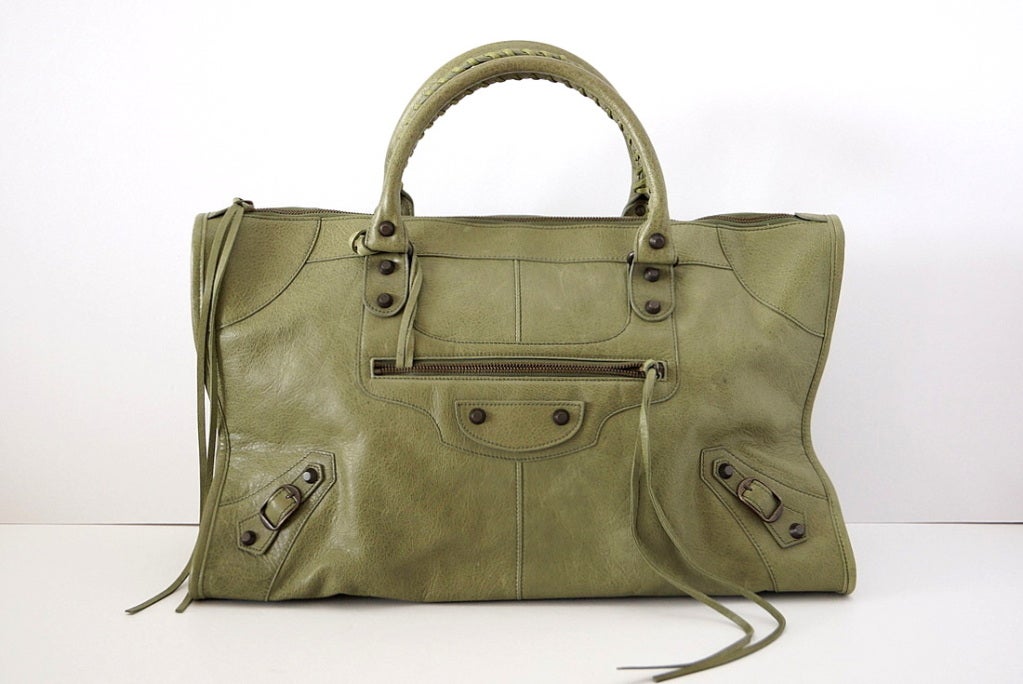 **Buyer MUST contact me prior to purchase for shipping and payment requirement details.
mad4couture@gmail.com**
Classic Classic Work Bag in MILITARE. 
Pale military green is utterly neutral and perfect for year round wear!  
Signature soft and