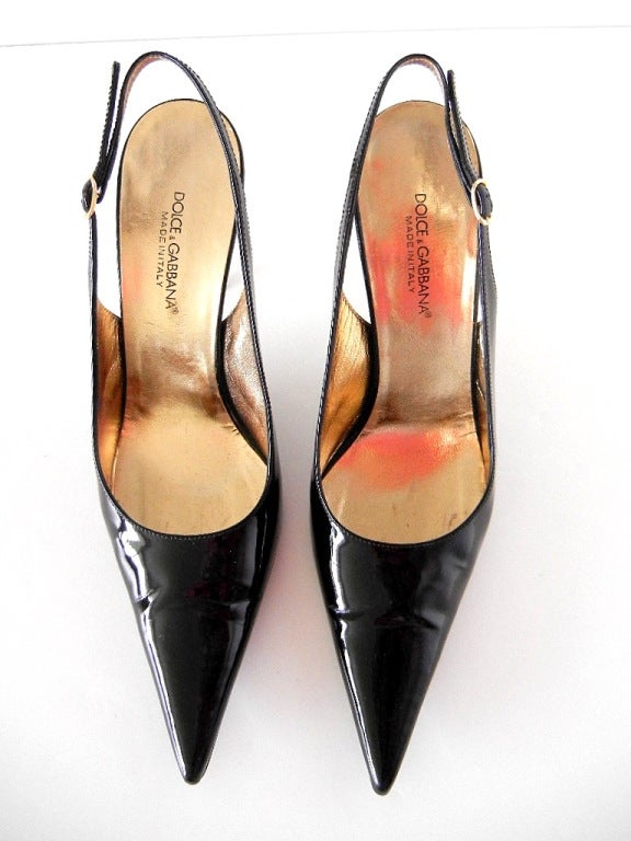 **Buyer MUST contact me prior to purchase for shipping and payment requirement details.
mad4couture@gmail.com**
Signature slingback in jet black patent leather with a stiletto shaped heel.
Perfectly shaped slingback that stays on the heel of the