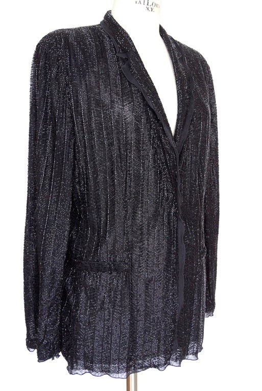 Jet black bugle beads create herringbone design.
Small lapel and jacket edged in black chiffon.
Exquisite.
Worn 1 time only if that.
Please check measurements.
more pictures available upon request

SIZE 48
USA SIZE 12

JACKET MEASURES: 
LENGTH   