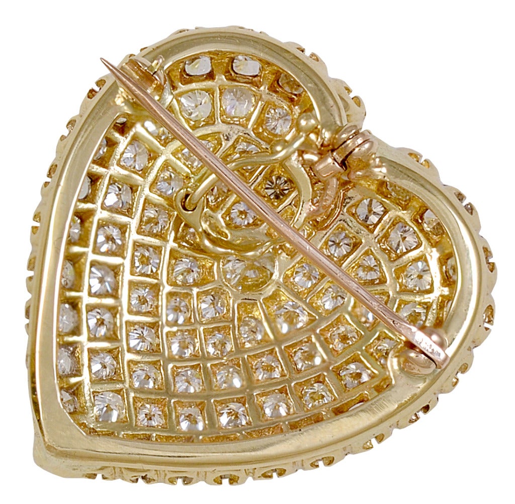 Beautiful figural heart pin with a hidden bale so it can be used as a pendant.
4.0 cts of very brilliant diamonds.  1 1/4