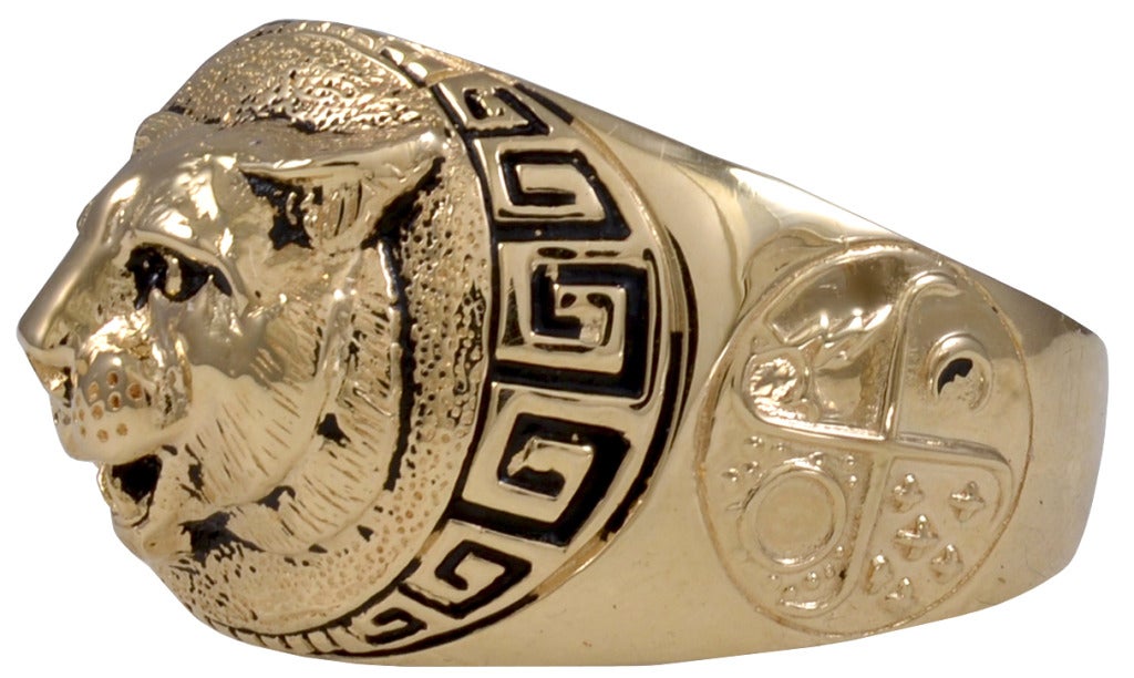 Large heavy gauge 14k gold ring with applied tiger's head in high relief. Greek key border with black enamel. Crests on sides.
May be sized. Size 11 3/4
For the big Cat in your life.