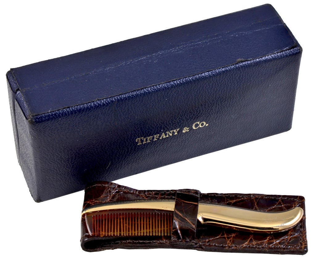 Tiffany&Co 14K gold 1940's moustache comb in original alligator leather case.Perfect condition. For the man who has everything.
Alice Kwartler has sold the finest antique gold and diamond jewelry and silver for over 40 years. Come and visit our