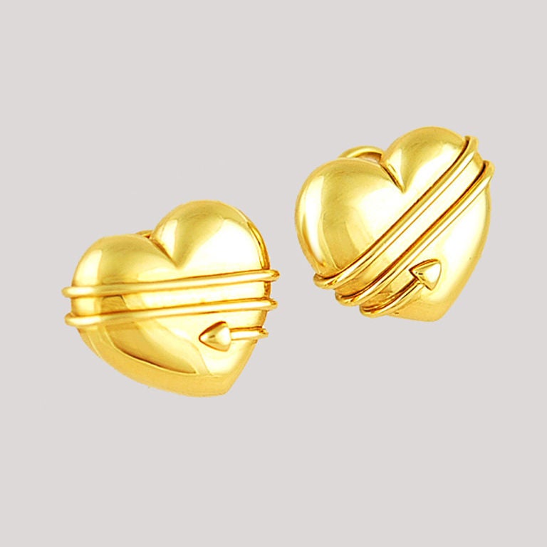 Signed Tiffany Heart Earrings With Applied Arrows<br />
18K gold; 3/4 inches in Diameter