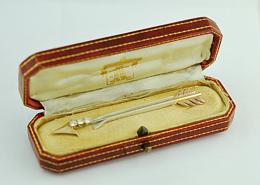 Cartier diamond and 18K gold arrow brooch/stick pin.The arrow is encrusted with full cut brillant faceted diamonds approx .20 cts. Perfect for a jabot!!! <br />
F-G color diamonds