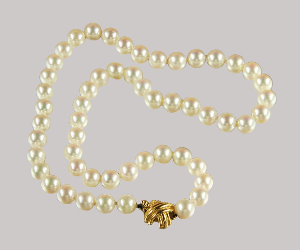 Signed Tiffany Pearl Necklace with 18K Gold X Clasp
18