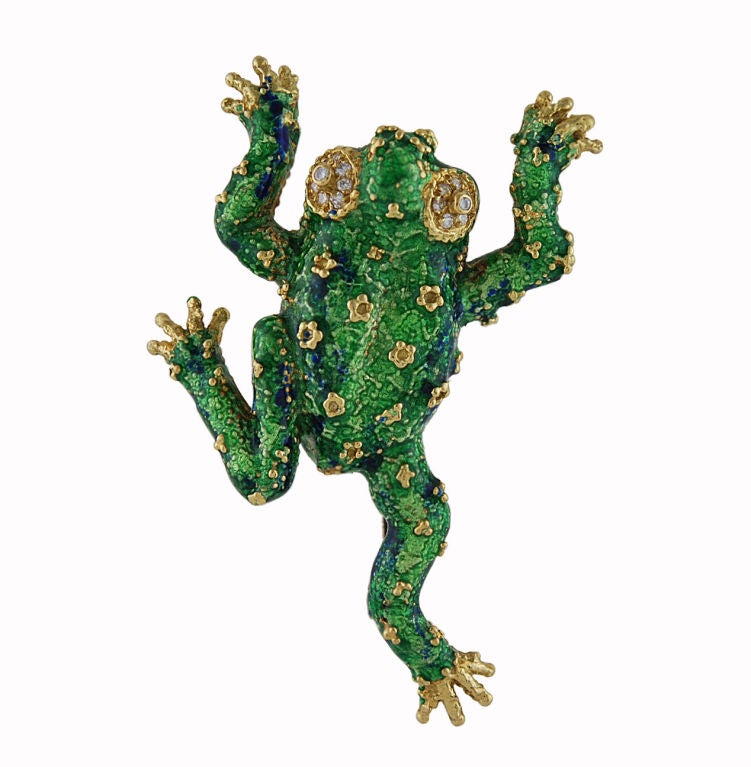 18K gold enamel life like frog pin, full of character; set with diamond eyes, surrounded with smaller diamonds.<br />
This frog will turn you into a princess!