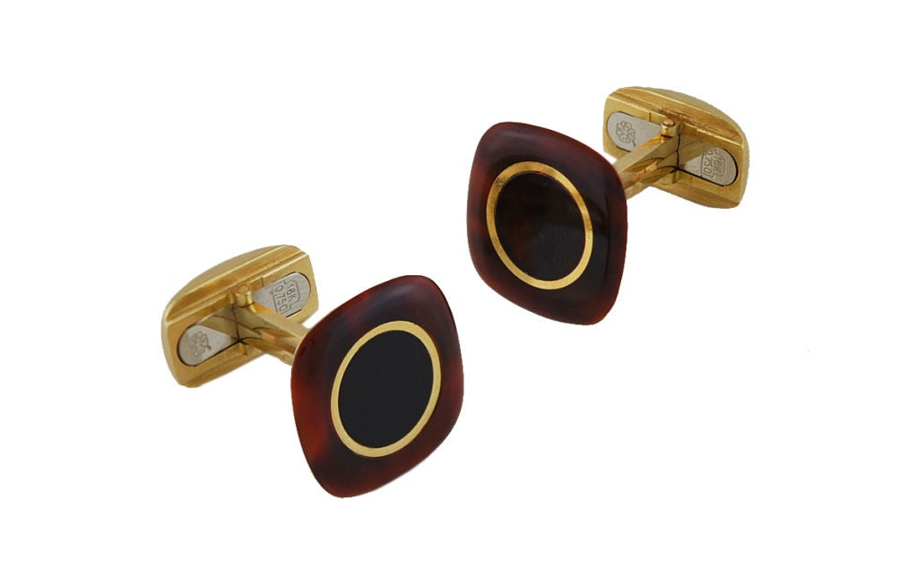 Exceptional VCA 18K tortoiseshell cufflinks. Square shape with rounded corners. Black enamel center with 18k ring and tortoise shell border. Most unique and rare cufflinks