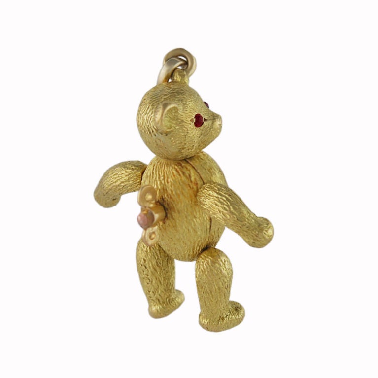 For the world's most adorable baby; an18K gold figural Teddy Bear charm made in France by Tiffany& Co. Fully textured body , with arms and legs that move. Faceted ruby eyes.
Welcome to this World!
Alice Kwartler has sold the finest antique gold