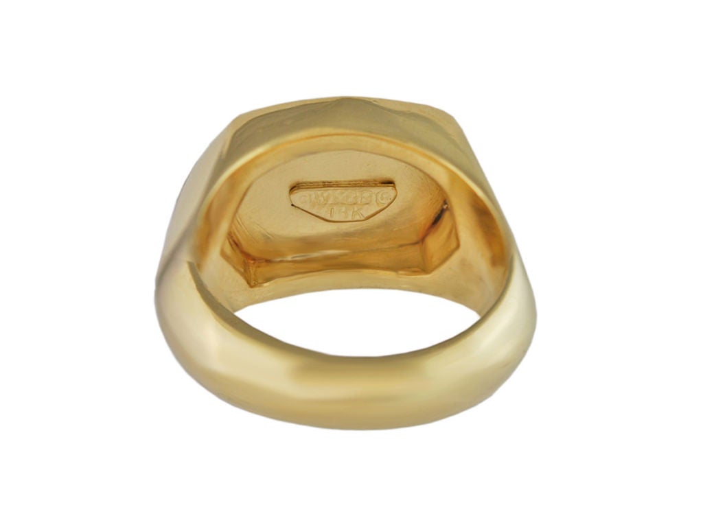 Rare signed DAVID WEBB 18K gold ring with two deeply carved fish swimming together.<br />
Size 7 and may be sized
