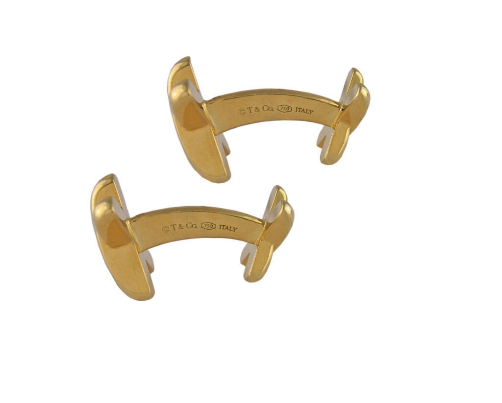 Tiffany & Co 18K gold double-sided X cufflinks.
Classic look!