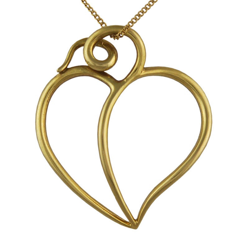 Tiffany & CO Paloma Picasso 18k heart with chain. Very graceful open heart, convex shape gives depth and dimension. 
28