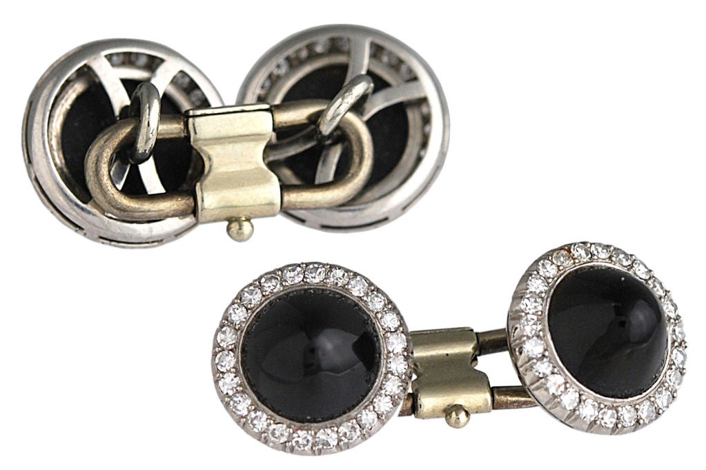 Very fine antique doulbe-sided cufflinks; Domed onyx centers, surrounded by diamonds, set in platinum. 18K gold connectors