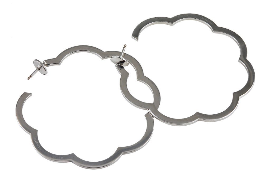 Classic Chanel 18K white gold Camelia Earrings in the large size.<br />
One can almost picture COCO in them. A Great LOOK!!!