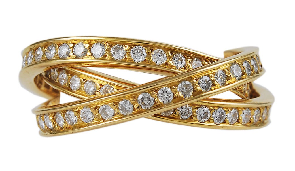 Cartier 18K gold  triple rolling ring, covered in diamonds. A sight to behold!!!<br />
Size 8 3/4