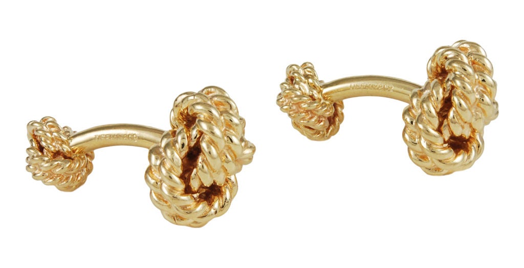 Most unusual and rare Tiffany 14K gold double-sided knot cufflinks. Extra large in size and exceptionally heavy. Very solid. A great look that you do not see anymore!