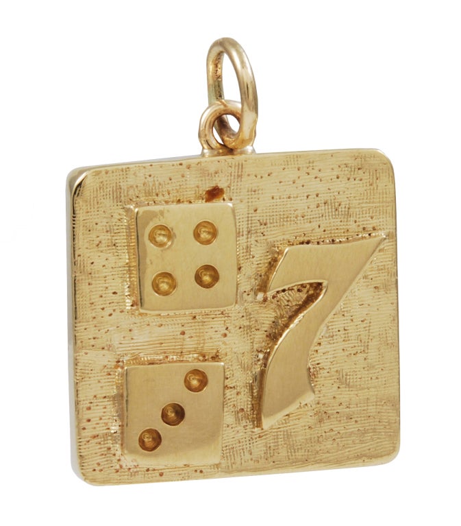 Fun Lucky Seven charm in 14K yellow gold. Brushed gold finish with applied polished gold 