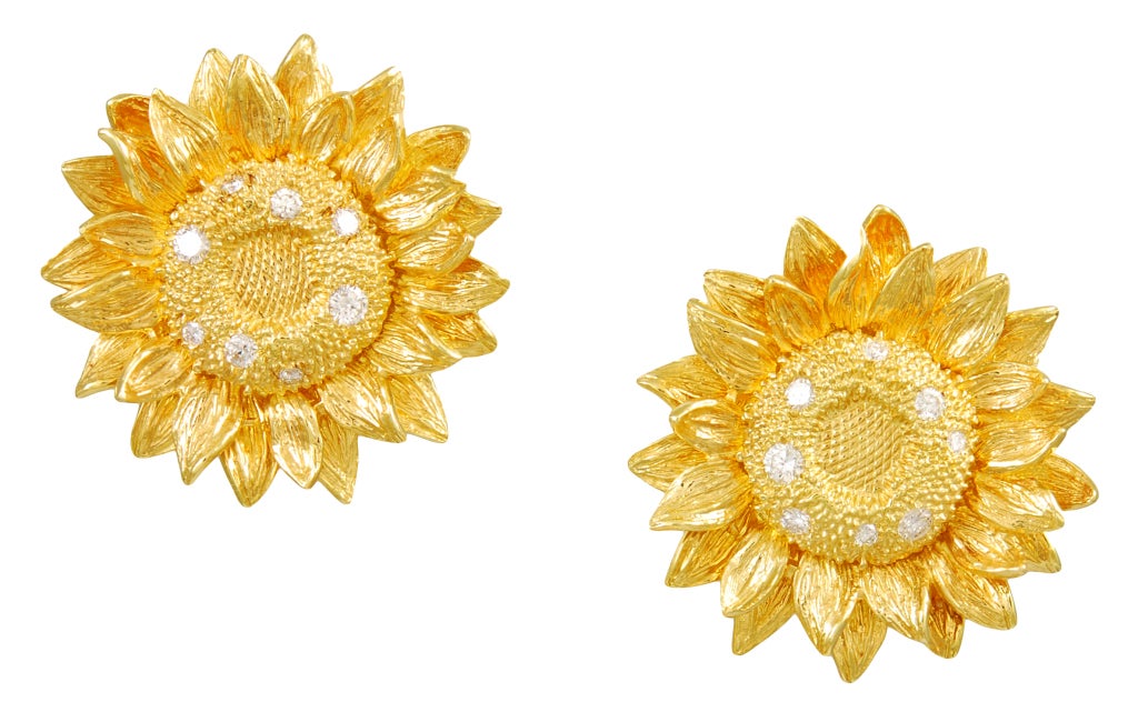 Figural sunflower earring and pin suite made by ASPREY. 18K gold, scattered with diamonds. Very crisp detail.A pristine old set in orignal presentation case.Lovely to find earrings and pin together
