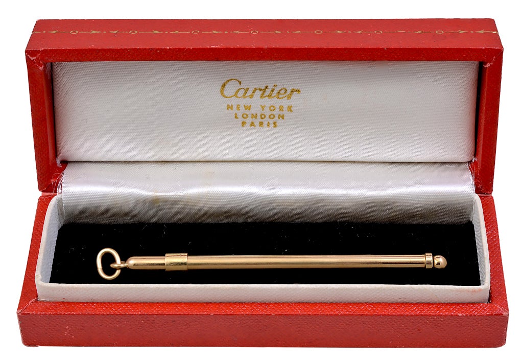 Cartier 14k gold swizzle stick, signed and numbered in orignal presentation case.
Just in time for New Years!!!