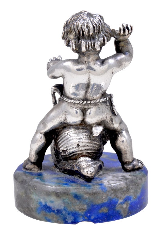 Charming sterling silver sea nymph riding a snail on original lapis base. Crisp beautiful details.A unique addition to a miniature collection!