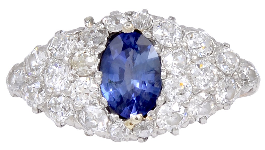 Beautiful shimmering diamond and sapphire ring set in platinum and 18K gold.  2.0 cts of sparkling white diamonds surrounding a 0.75 ct true blue sapphire.  Size 6 and may be sized.  A very special presentation.  

Alice Kwartler has sold the