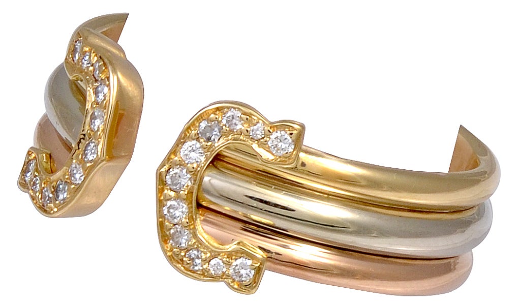 Classic 18K gold tri-color signature ring, signed and numbered by Cartier. Double 