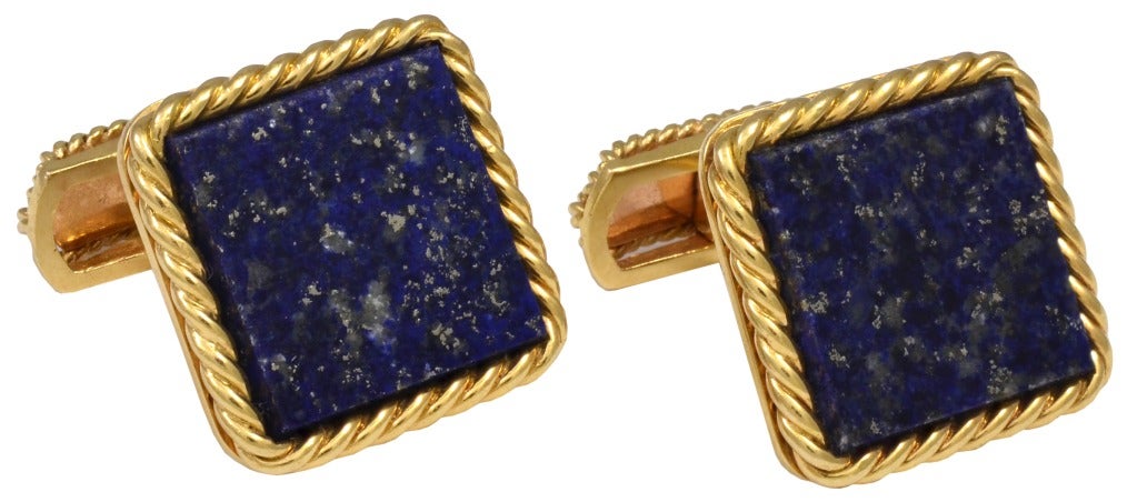Very handsome square lapis cufflinks set in 18K gold rope border.  Back bar, also rope designed,swivels to open and close.  The lapis contains beautiful gold markings.  Impressive size and shape-- 2/3 inch square.  Superior quality and