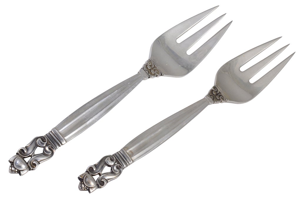 Full set of 12 fish forks and 12 fish knifes in the Acorn pattern by Georg Jensen. Sterling Silver.
Fork 6 1/2