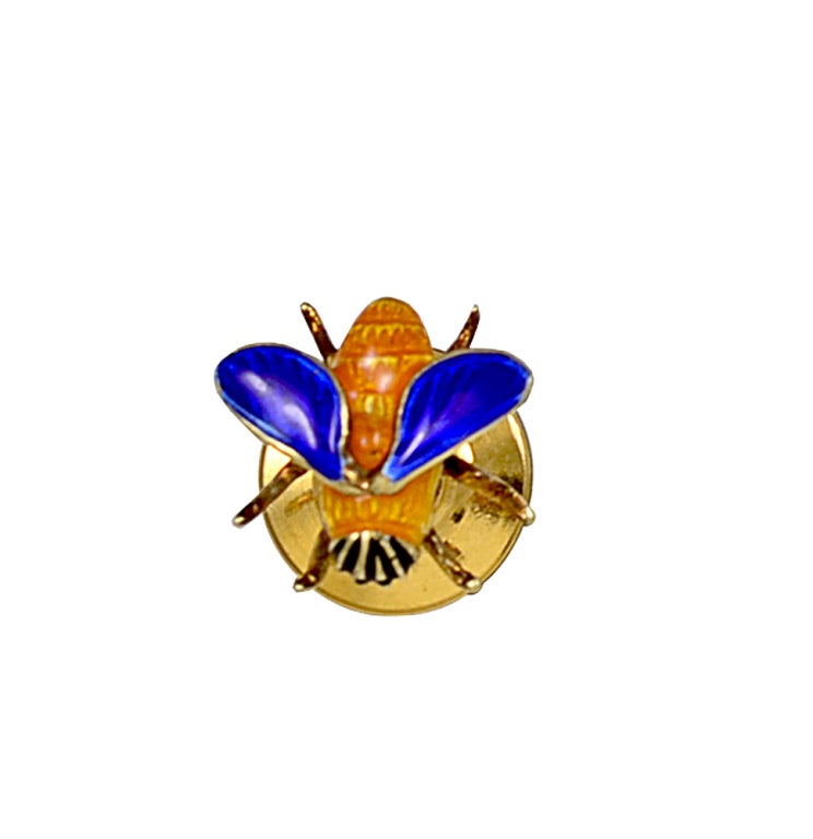 Figural mini pinch back pin of enamel honey bee set in 14K gold signed by Tiffany& Co, Wonderful and colorful  to wear on a lapel.
Alice Kwartler has sold the finest gold and diamond jewelry for over 40 years. Come and visit our magnificent store