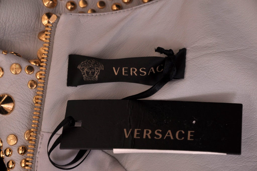 New and Most Wanted VERSACE STUDDED LEATHER DRESS at 1stdibs