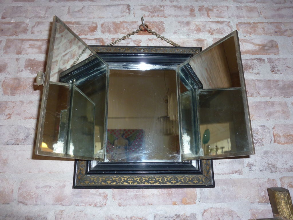 Unique, black ebonized triptych mirror with 19th century front paintings  on ceramics.