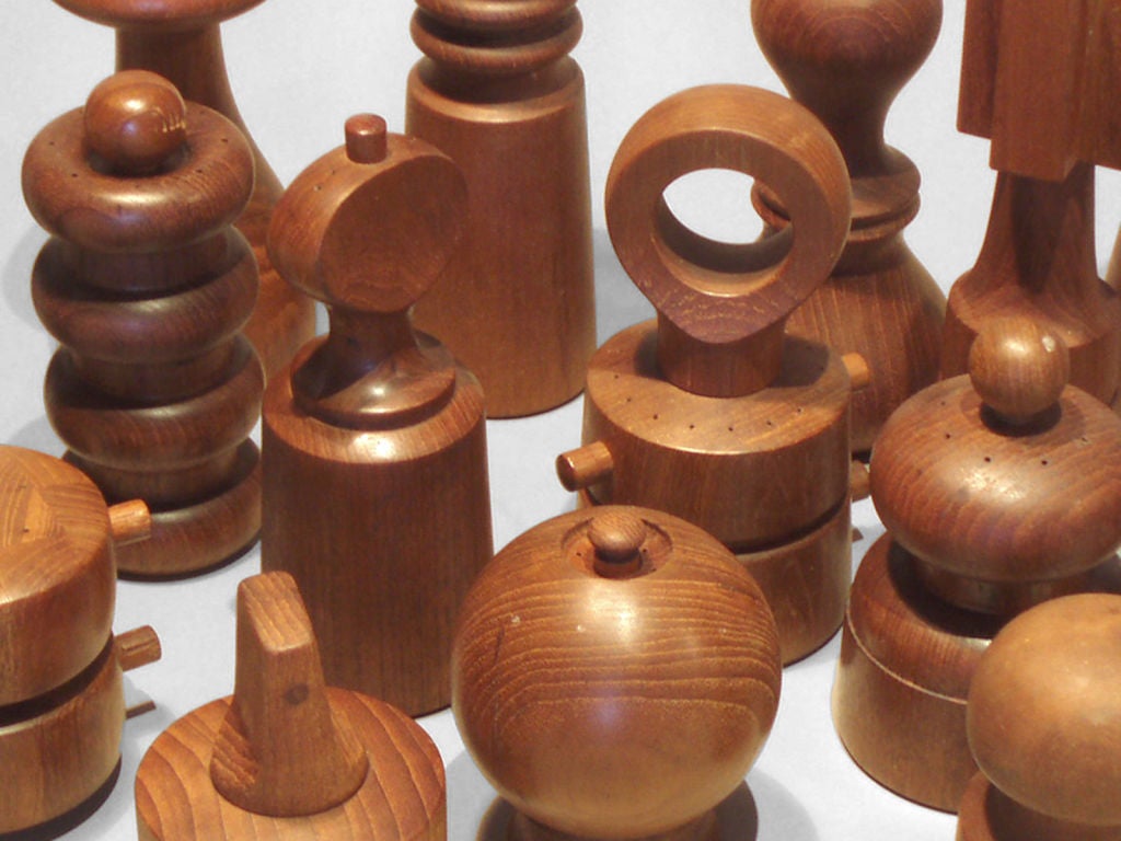 A large collection of teak pepper mills by Jens Quistgaard for Dansk. All are Marked Danish. Sizes vary, 23 pieces in all.