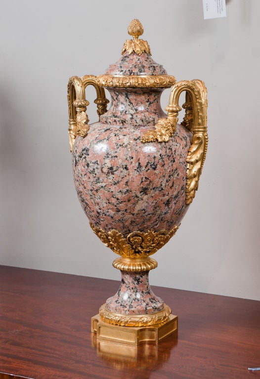 Important Belle Époque period Louis XVI style granite urn fitted with fine gilt mounts.
