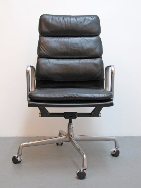 black leather Charles Eames for Herman Miller soft pad executive desk chair
height adjustable, swivel and tilt limiter, height adjustment knob and half dome wheel caps on a early 4 star base, marked with HM tags
