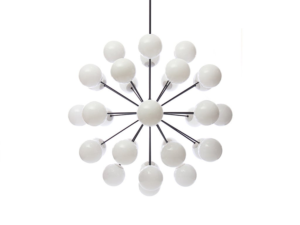 A monumental sputnik-form ceiling fixture with thirty-three arms extending from a central orb, each punctuated with a 10