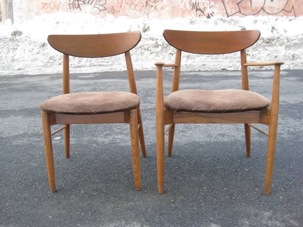 Set of 10 Very Comfortable Mid Century Modern European Dining Chairs In the Manner of Finn Juhl, with Floating seat, Ten pieces include 2 Arm Chairs and 8 Side Chairs, Will Reupholster Free of Charge With Clients Fabric or Leather, Arm Chairs