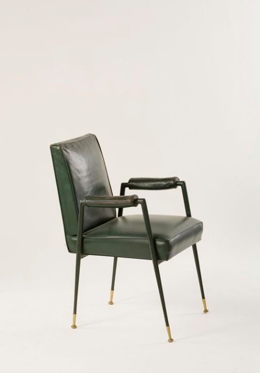 Single Armchair by Leleu <br />
Original green leather & leatherette<br />
raised on couture sellier leather wrapped legs ending in gilt-bronze sabots<br />
<br />
Seat H: 18 ½”  -  Arm H: 26”<br />
<br />
Bibliography:<br />
Identical