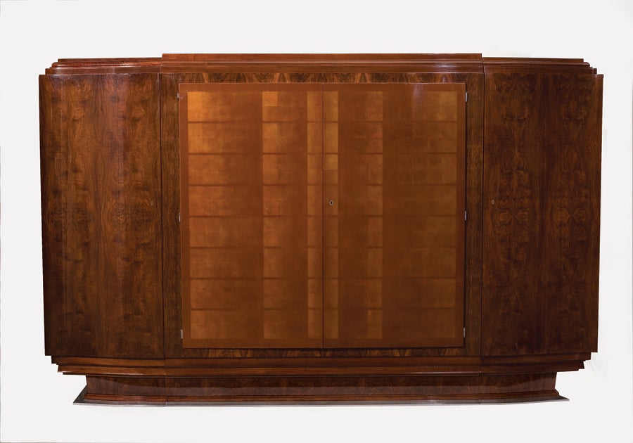 Unique and important Art Deco four-door cabinet in walnut with lacquered doors and nickel-plated details.

Lacquer work by Katsu Hamanaka (1895-1982).

Provenance: This cabinet was specially designed for Mr. & Mrs Goy and the Salon des Artistes