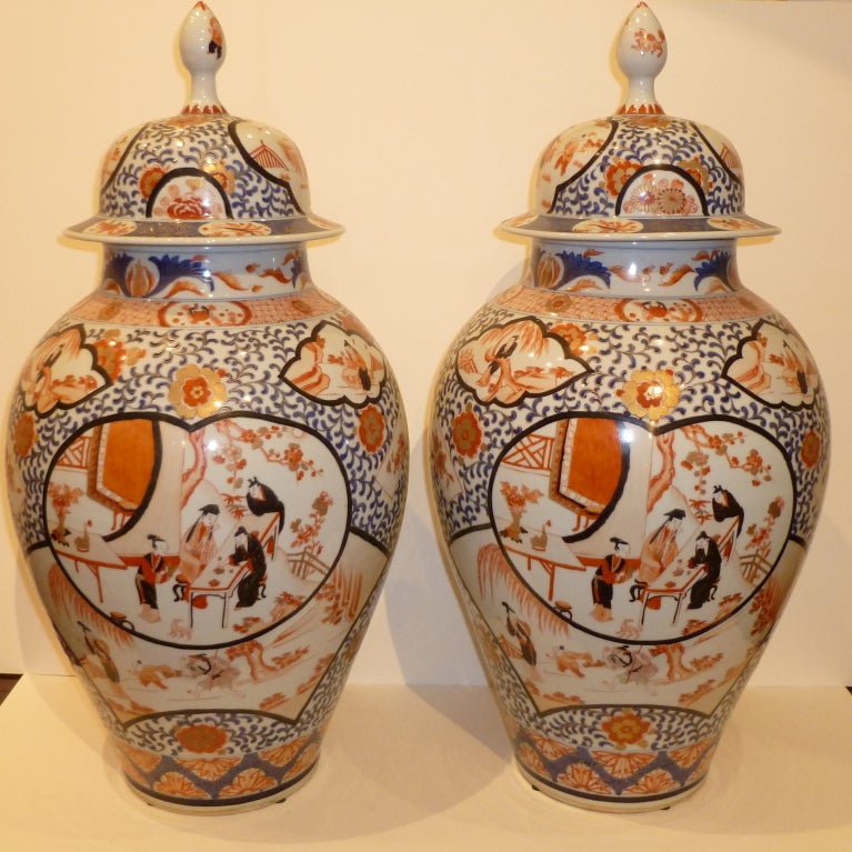A Pair Of Chinese Imari Porcelain Jars with Covers
