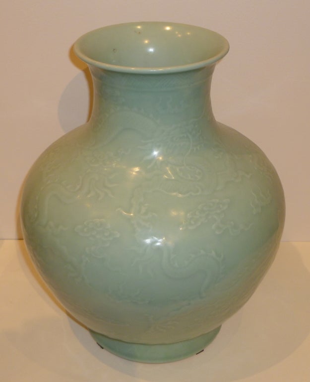 Chinese A Pair Of Porcelain Vases With Under Glaze Dragon Motif