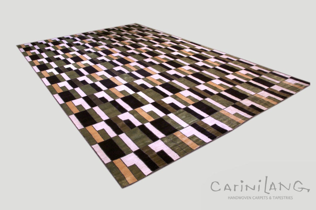 Deco, a Carini Lang Signature Collection carpet by Joseph Carini is a masterful example of how this artist's proprietary formulas of botanical dye combine with silk for the richest, most dynamic color. Here, a deep espresso on silk has the hand and