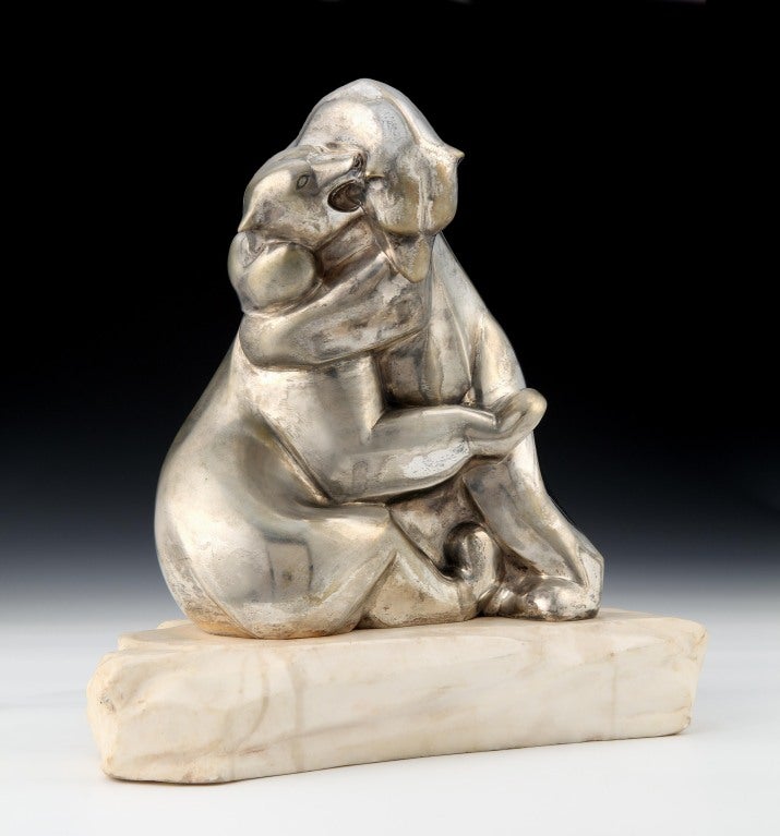 A rare Art Deco silvered bronze sculpture of a pair of polar bears, the bronze resting on a white alabaster socle, bearing impressed marks of FRANCE 7010, signed Lavrov in the bronze.