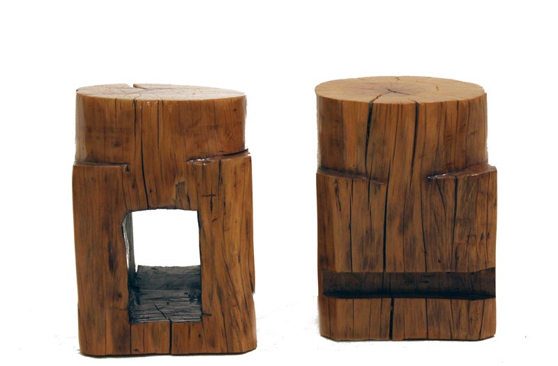 Two beautiful sculptural stools made of solid salvaged Peroba. Each stool has been handmade and finished to show the woods rustic beauty. These were relieved from an old Cocoa mill gear. These stools were conceived by emerging Brazilian designer