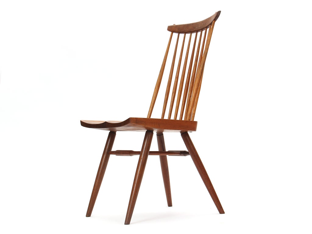 A walnut 'New Chair' dining chair with hickory spindle back.