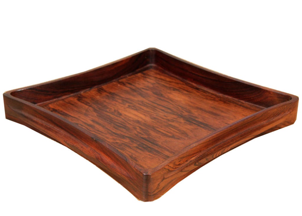 Jens Quistgaard IHQ for Dansk serving tray of solid rosewood from the limited production Rare Woods line.Sculpted frame with active grain Brazilian rosewood in original condition.Signed with burned in stamp.