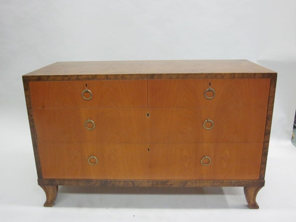 Elegant Swedish Commode / Console in Light and Dark Birch by Sweden Most Renowned Maker, Nordiska Kompaniet (NK). 3 Drawers open from Ring Pulls on each drawer. Height and Stucture Lend Well to  Use as a Console.