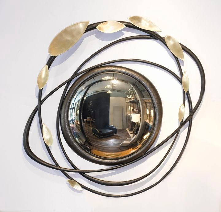 Contemporary polished and black-patinated bronze bull's eye mirror by Hervé van der Straeten.

Monogrammed:HV.

Limited edition of 40.