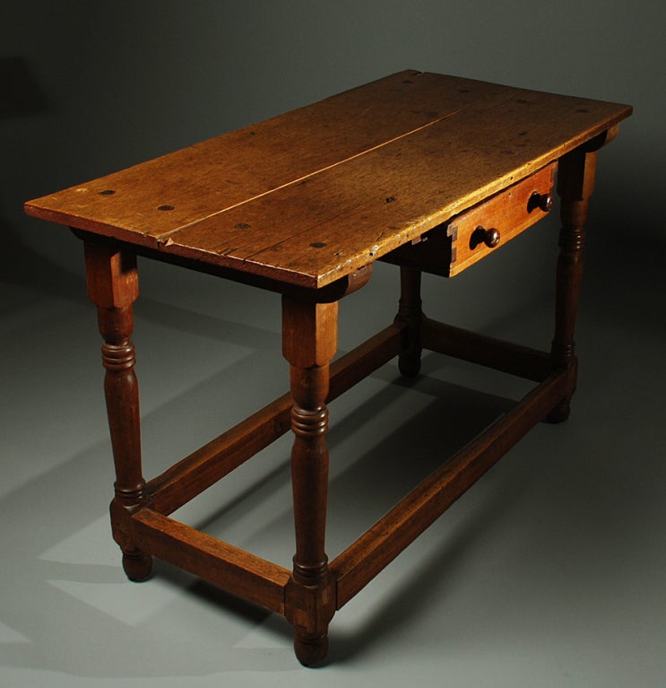 A good 18th century Mahogany table from Chiapas with turned legs, trestle base and suspended drawer.<br />
<br />
Dimensions: 50 inches x 24 inches x 32 inches.<br />
<br />
In overall excellent, original condition.<br />
<br